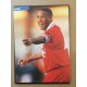 Signed picture of John Barnes the Liverpool footballer. 